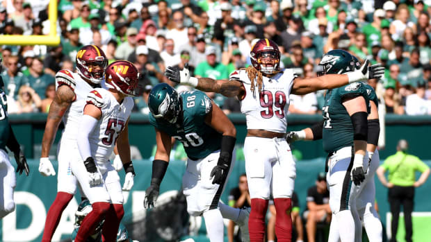 Oct 1, 2023; Philadelphia, Pennsylvania, USA; Washington Commanders defensive end Chase Young (99) celebrates his sack against the Philadelphia Eagles during the second quarter at Lincoln Financial Field.